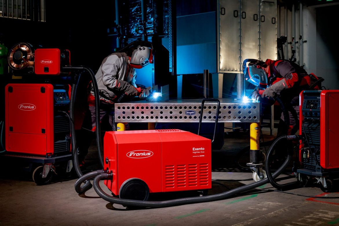 Photo of two welders and the Exento HighVac Duo fume extractor